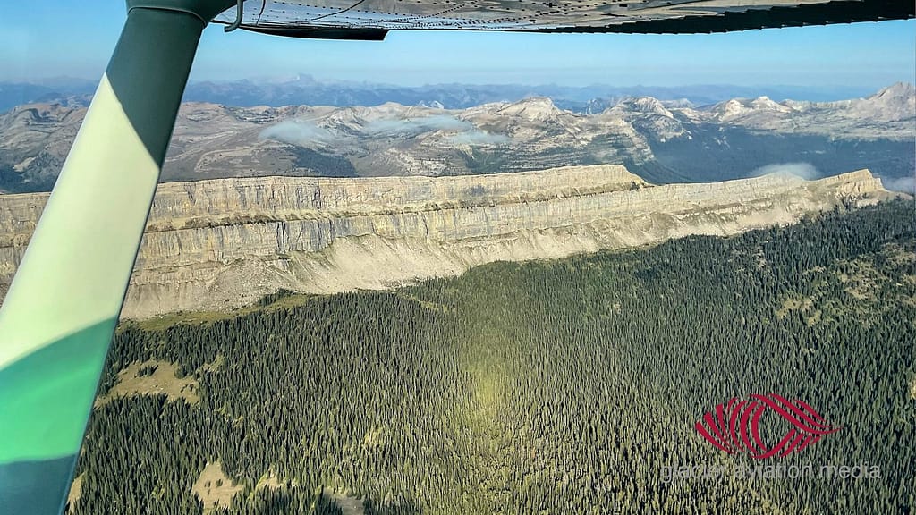 Aerial view from airplane of the iconic Chinese Wall in Bob Marshall Wilderness, Montana